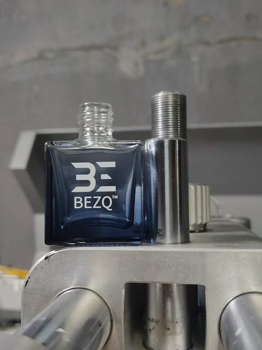 BEZQ car diffuser bottles being prepared during production