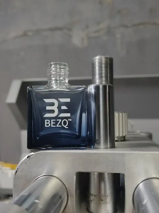 BEZQ car diffuser bottles being prepared during production