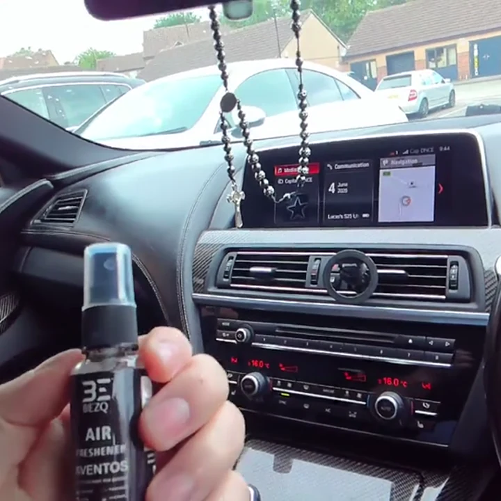 A real BEZQ Aventos air freshener spray being used inside a BMW